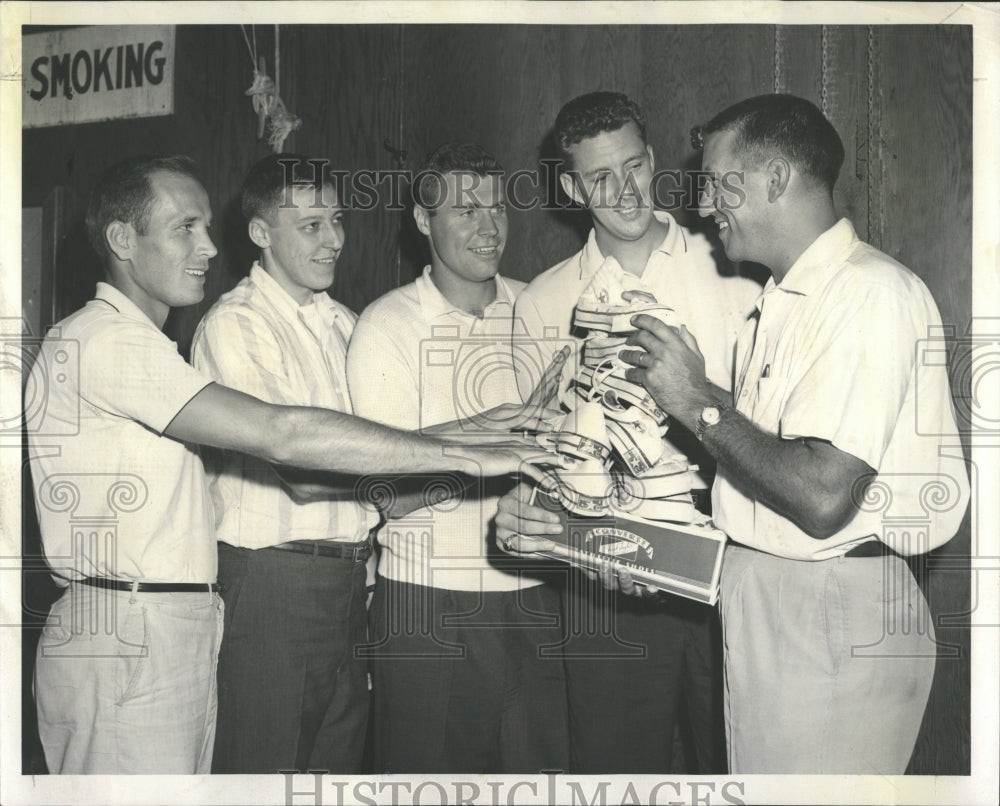 1959 Press Photo Coach Fred Schaus Hands Out Gym Shoes - RRW52019 - Historic Images