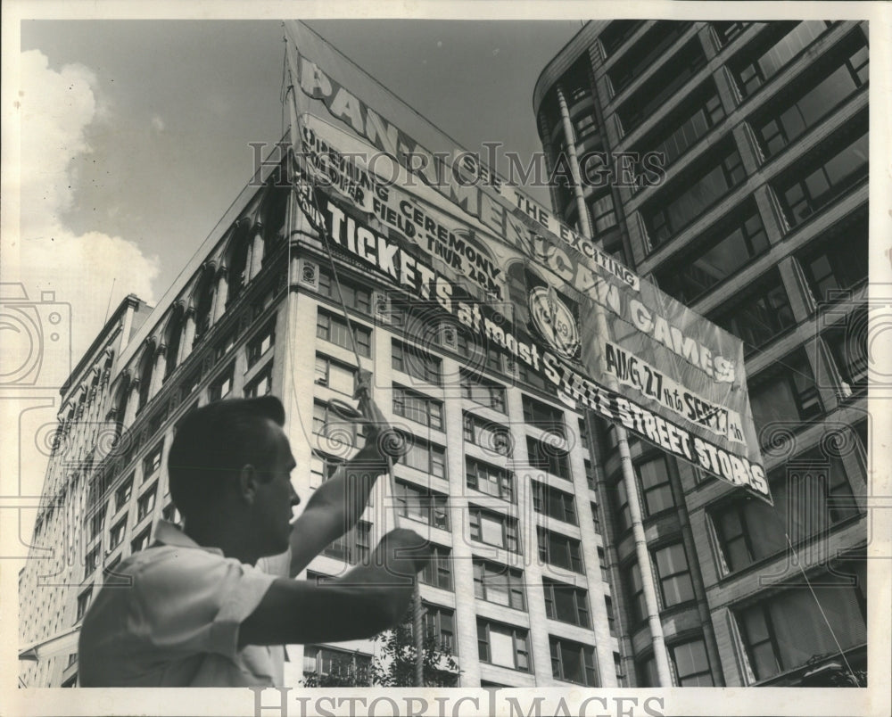 1959 Press Photo Pan American Games Banner Hoisted Up - RRW52075 - Historic Images