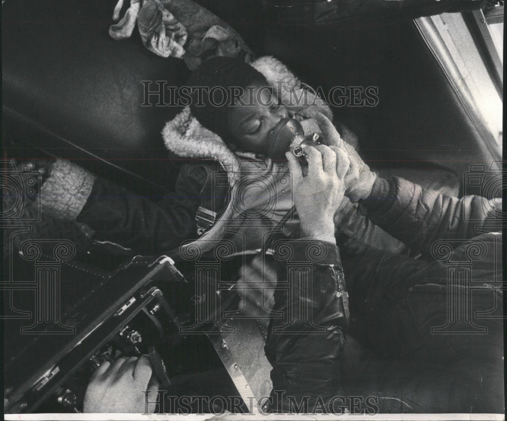 1974 Press Photo Falano Harris Rescued From Fire - RRW53393 - Historic Images