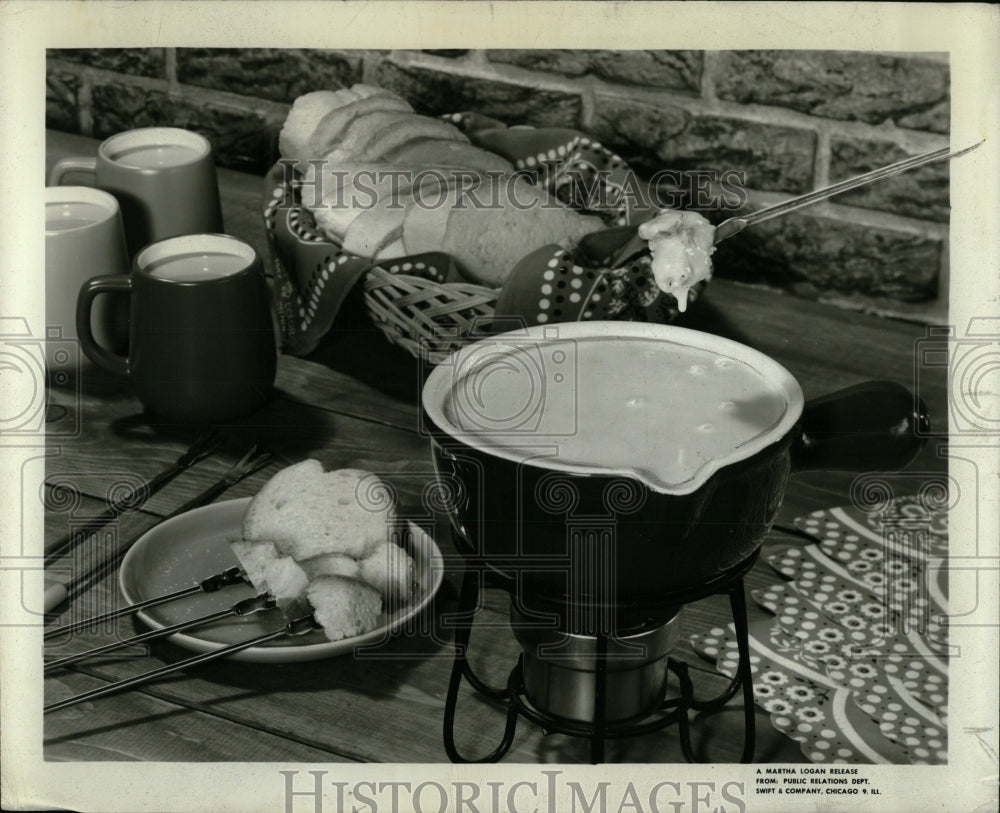 1968 Press Photo Melted Swiss Cheese Traditional Dish - RRW56787 - Historic Images