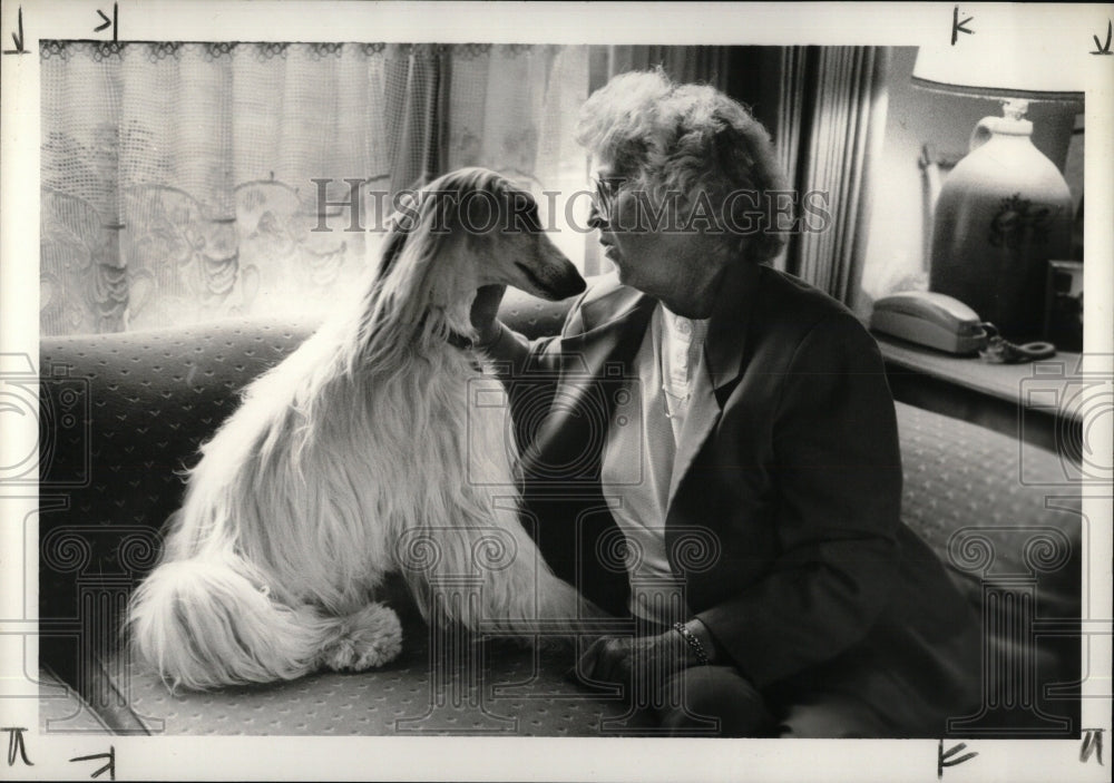 1989 Press Photo Woman With Adopted Afgan Dog Rescued - RRW57799 - Historic Images