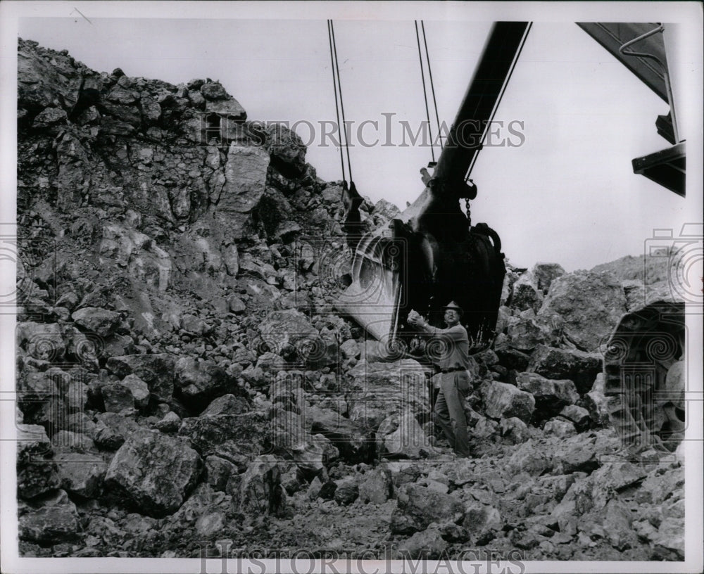 1953 Press Photo Maynard Van Opnum checks operations - RRW57931 - Historic Images
