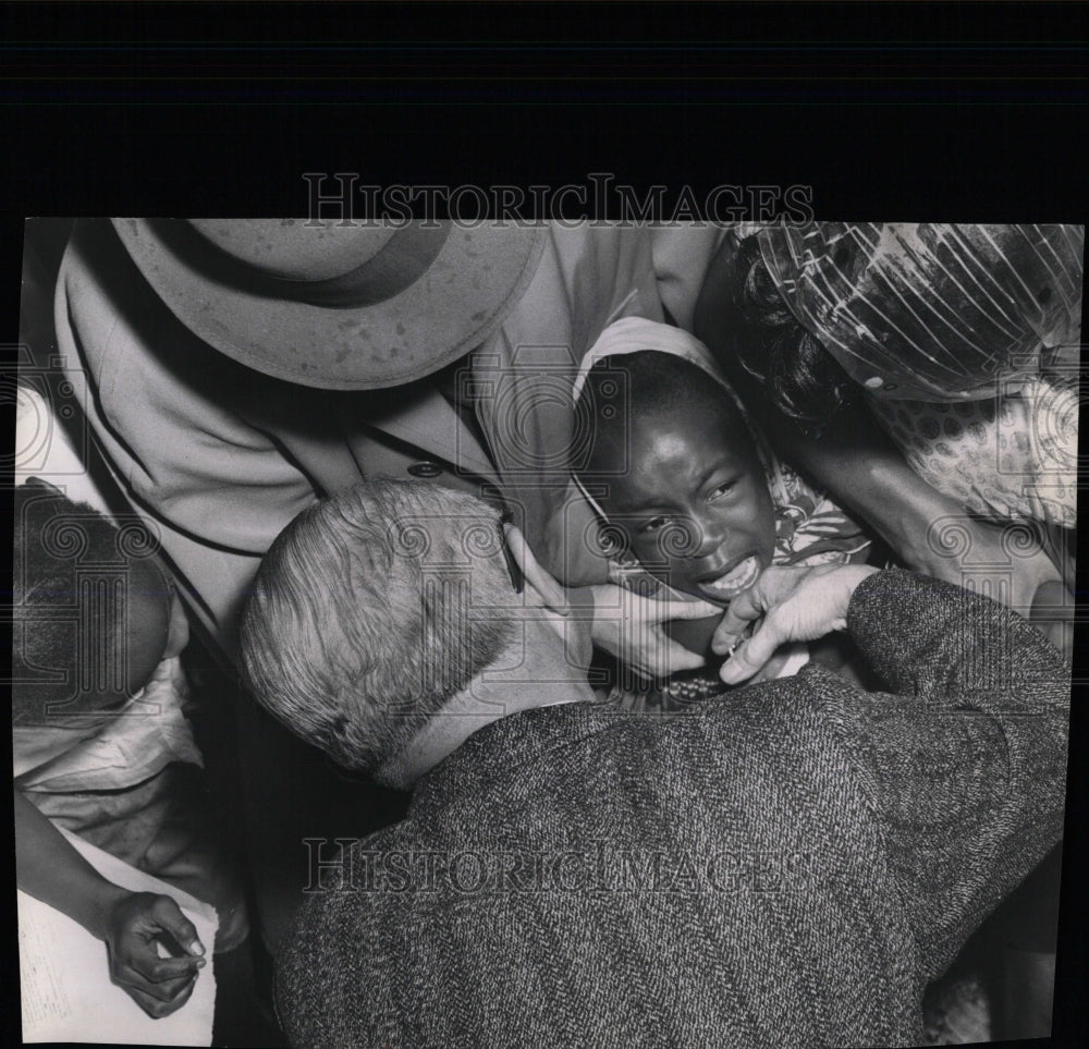 1961 Press Photo TYPHOID SHOT INGESTION FOOD WATER - RRW59645 - Historic Images