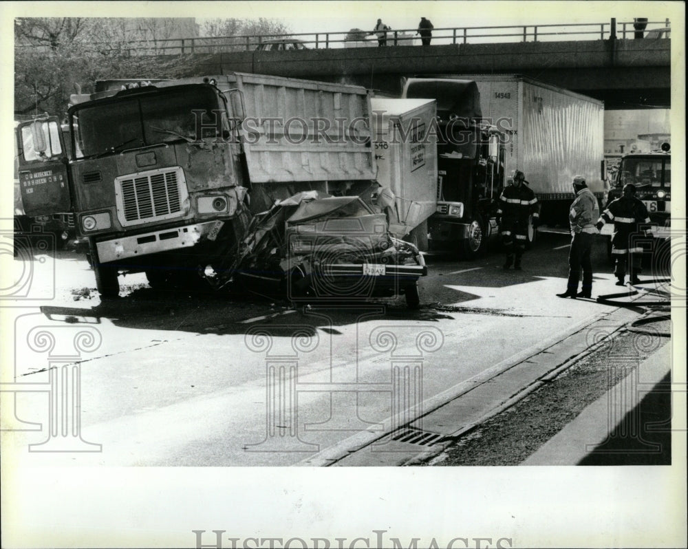 1987 Press Photo Car and Three Trucks Accident - RRW59765 - Historic Images