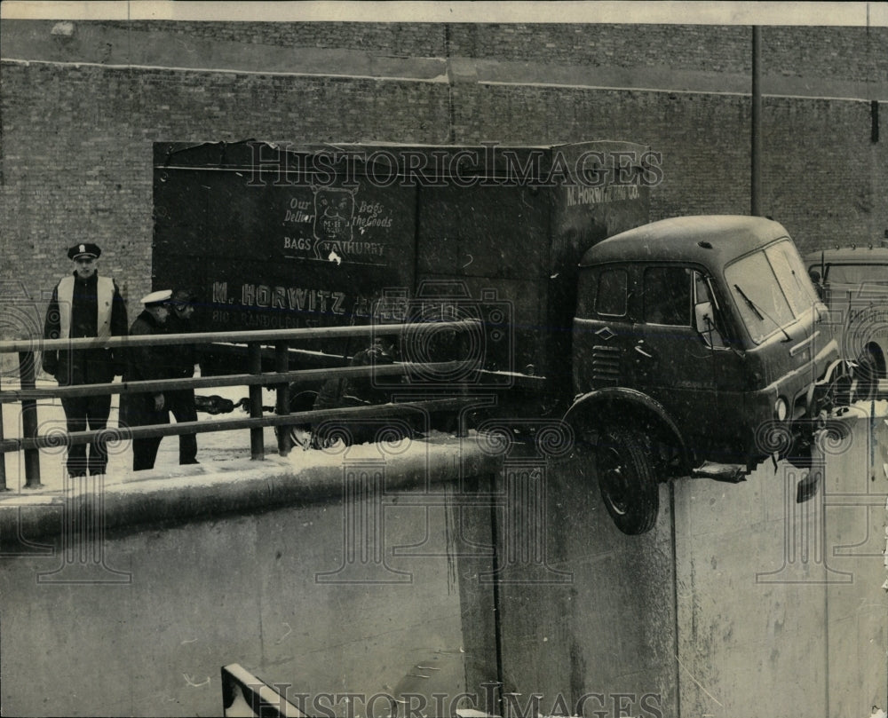 1965 Press Photo truck hanging over rail Nadison Street - RRW59861 - Historic Images