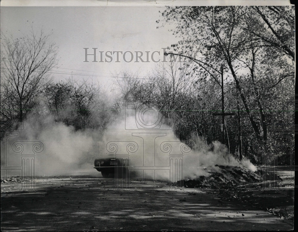 1966 Press Photo Fire from leave burning pile almost - RRW61137 - Historic Images
