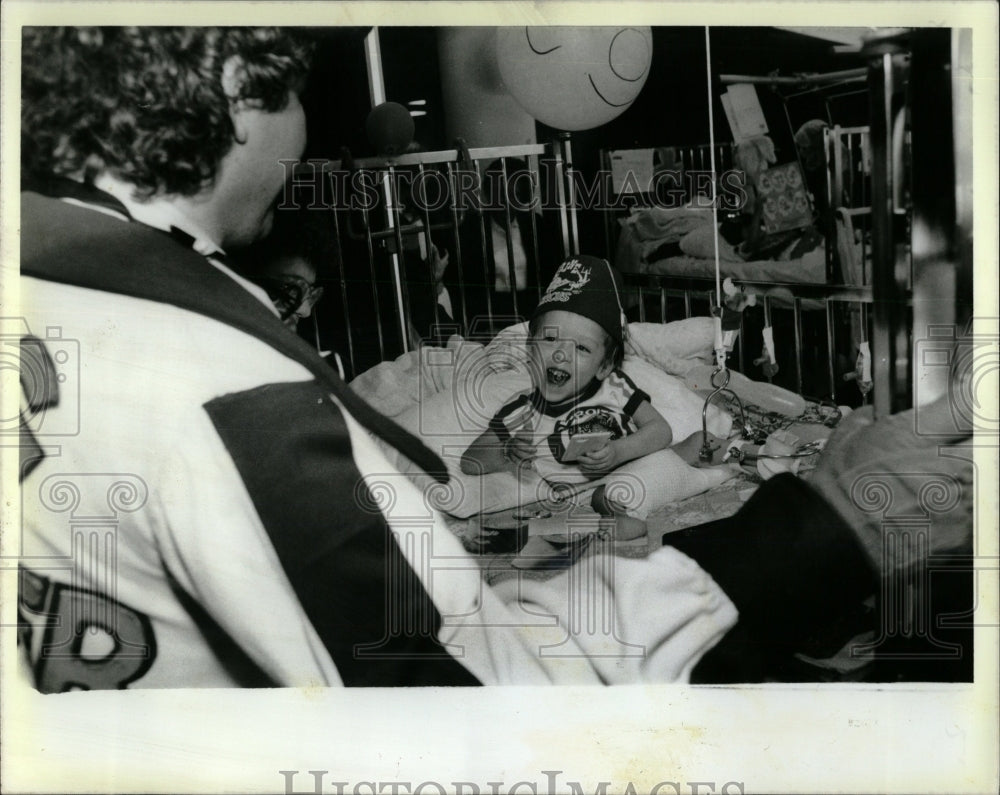 1987 Press Photo Three year old Kyle Griffith DogCatchr - RRW63729 - Historic Images