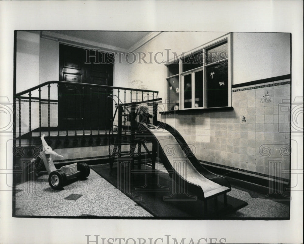 1972 Press Photo A Doll On An Empty Slide In A Playroom - RRW64509 - Historic Images