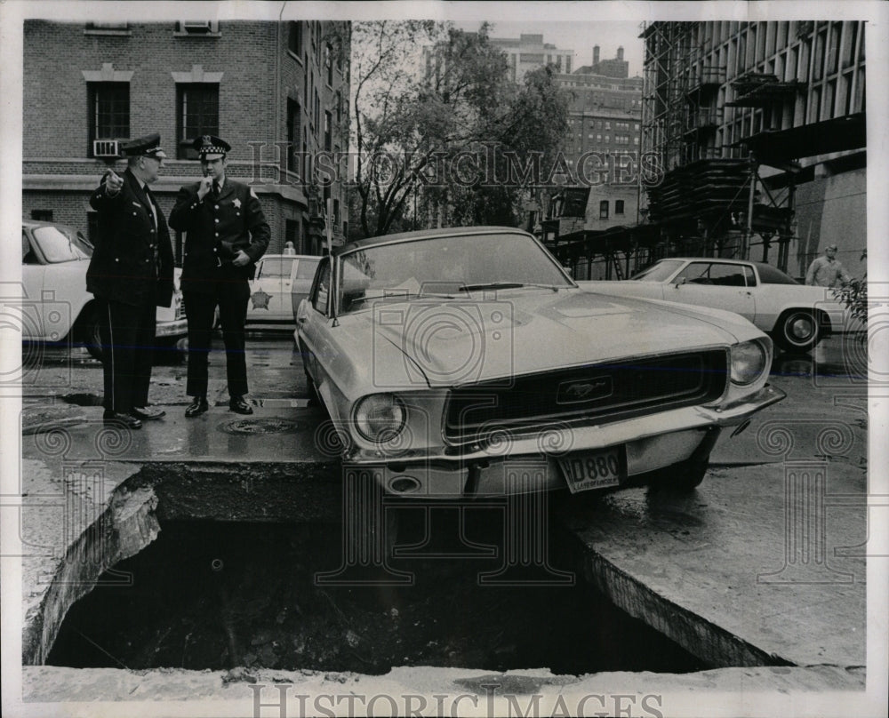 1969 Press Photo Sidewalk Caves In While Car Driving - RRW65847 - Historic Images