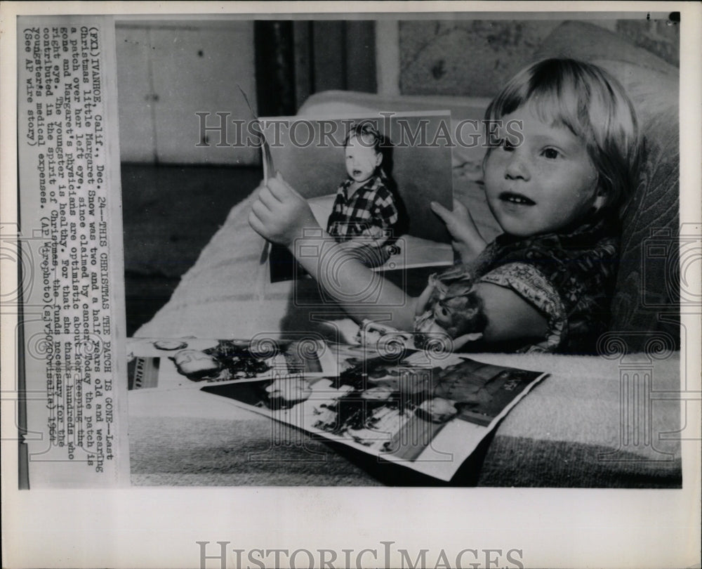 1965 Press Photo Christmas Margaret Snow wearing patch - RRW65993 - Historic Images