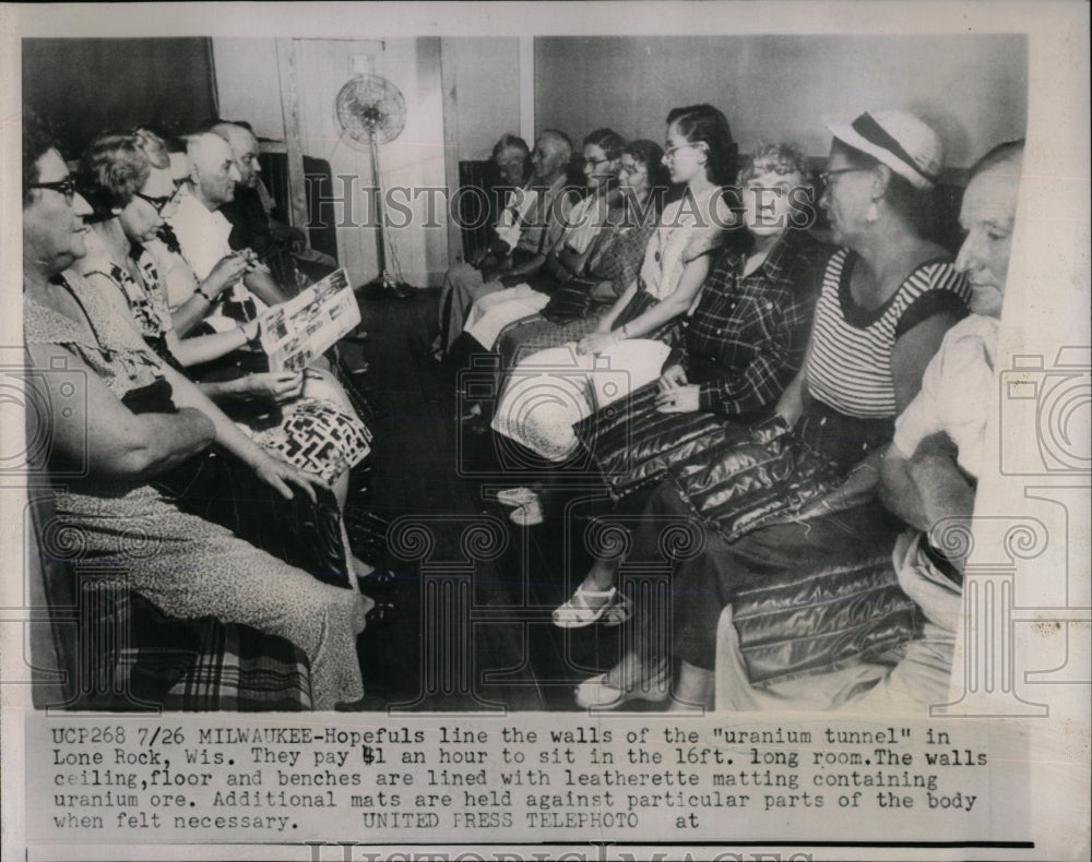 Press Photo Uranium tunnel wall peopel sit Lone Rock - RRW67173 - Historic Images