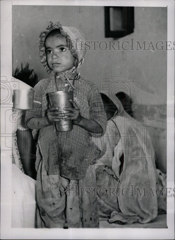 MISS UNICEF is a little boy from New Delhi, India. - RRW71589 - Historic Images
