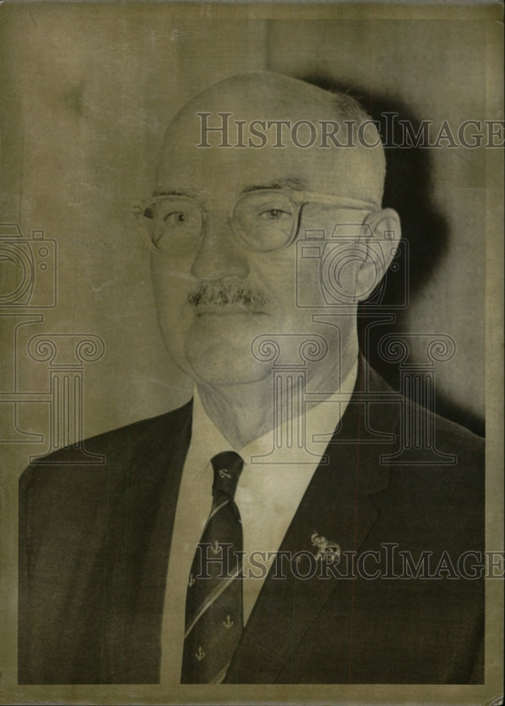 1958 Press Photo Man In A Suit Wearing Glasses - RRW72059 - Historic Images