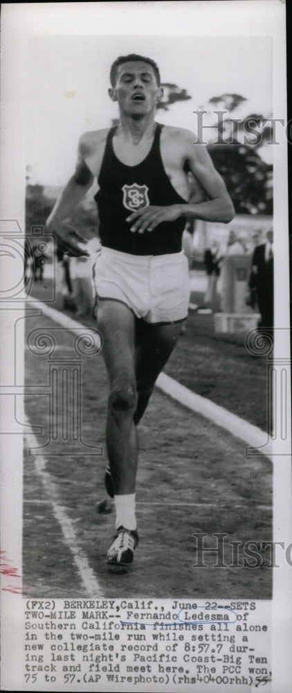 1955 Press Photo Fernando sets new record in 2mile run. - RRW73667 - Historic Images