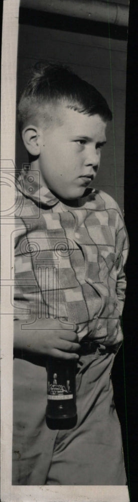 Press Photo Little Boy Holding Soda Bottle - RRW76875 - Historic Images