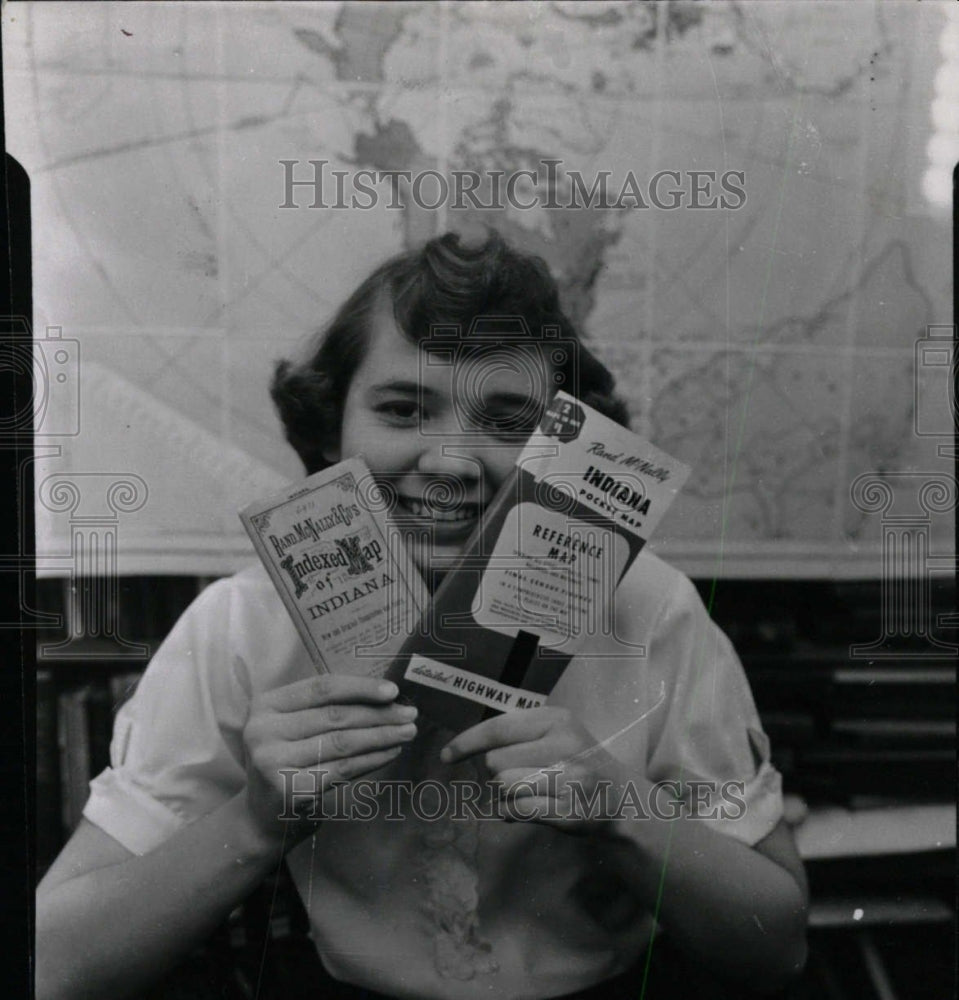 1957 Press Photo Woman Holding Rand McNally Maps - RRW76895 - Historic Images