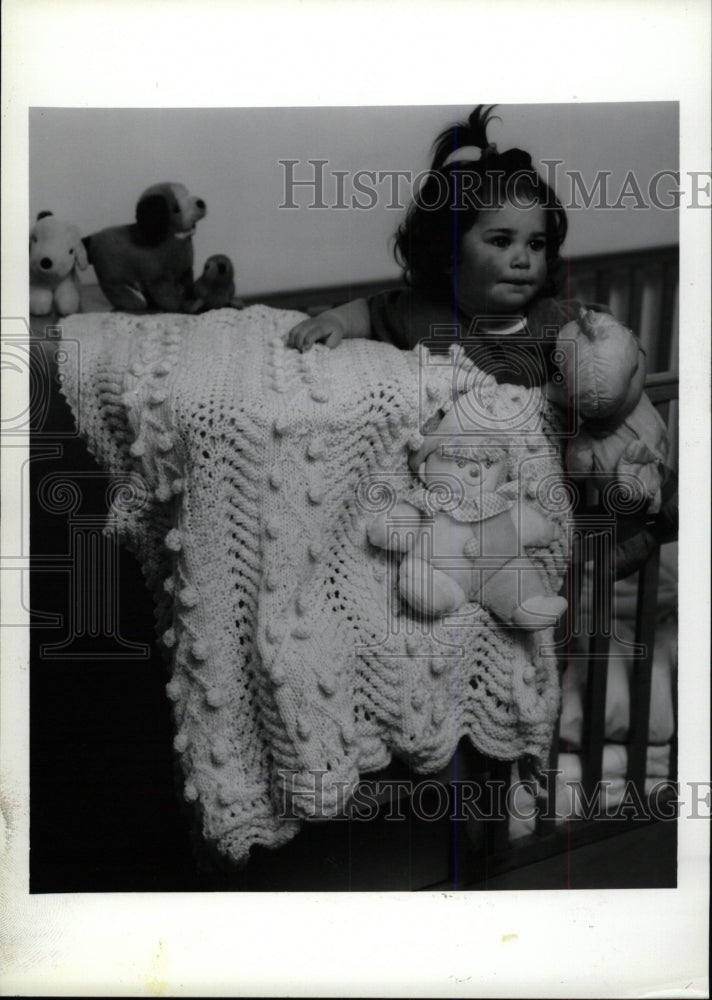 1996 Press Photo Baby Popcorn Afghan Dolls Hand - RRW79545 - Historic Images