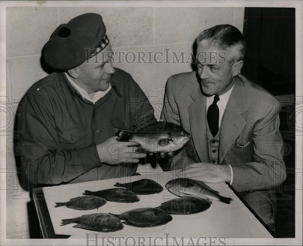 1951 Press Photo Everett Smith Tucker Conservation Fish - RRW84005 - Historic Images
