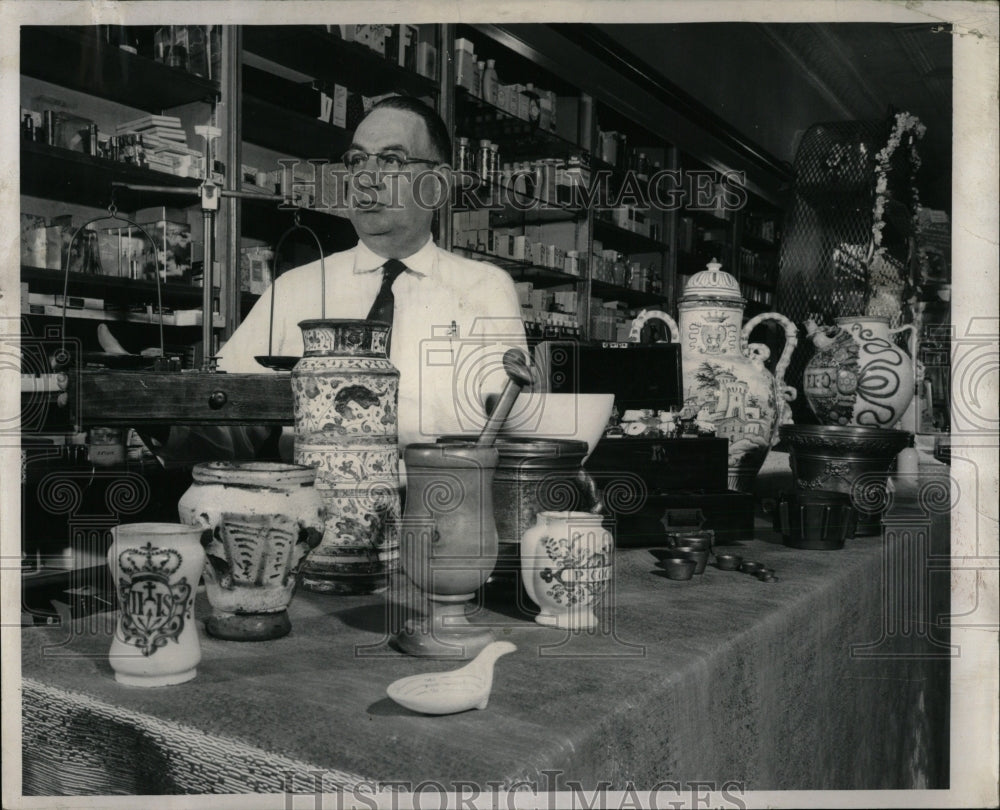 1958 Press Photo Wayne Westrope Geneva pharmacist Jars - RRW87859 - Historic Images