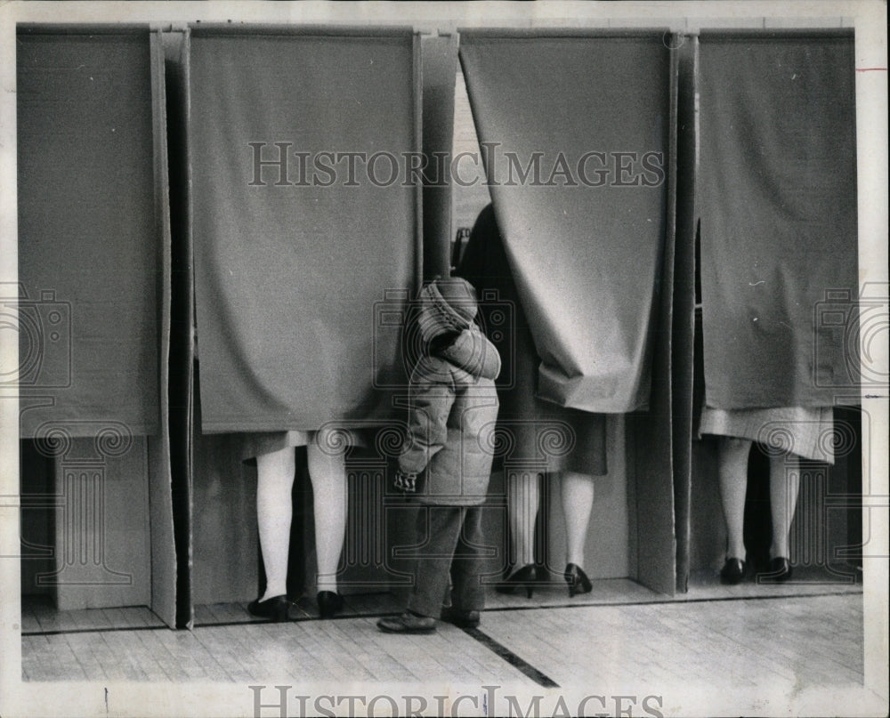 1969 Press Photo Women in Voting Booths Child Looks On - RRW89481 - Historic Images