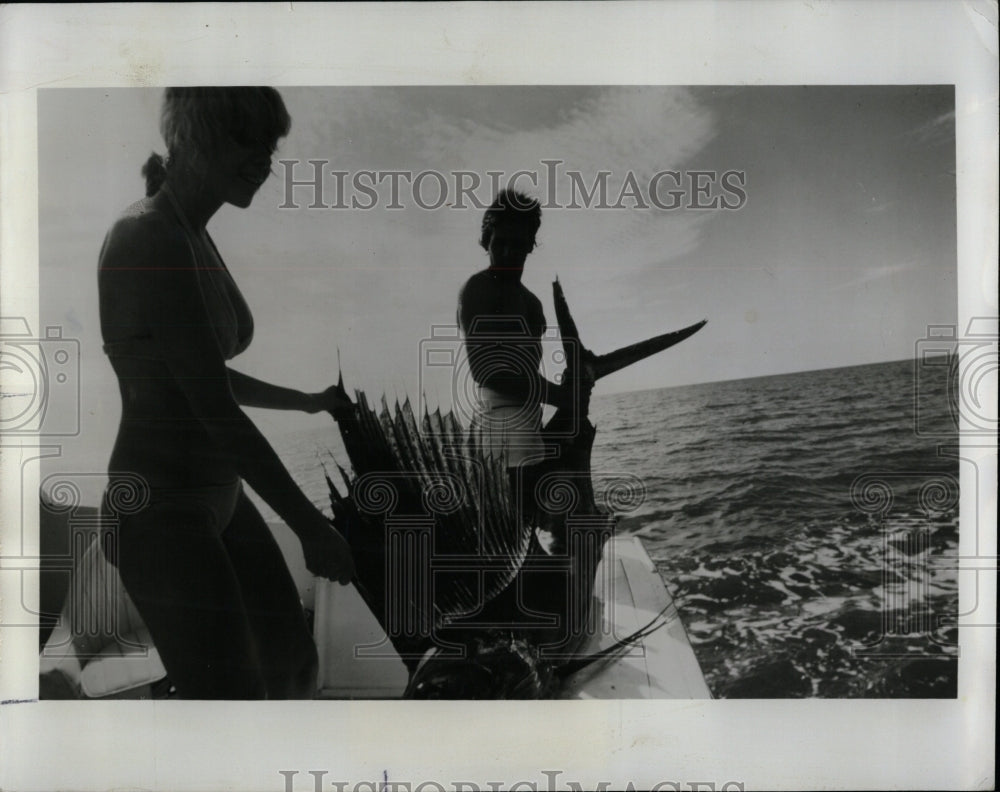 1976 Press Photo Deep Sea Fishing Women With Sailfish - RRW90357 - Historic Images