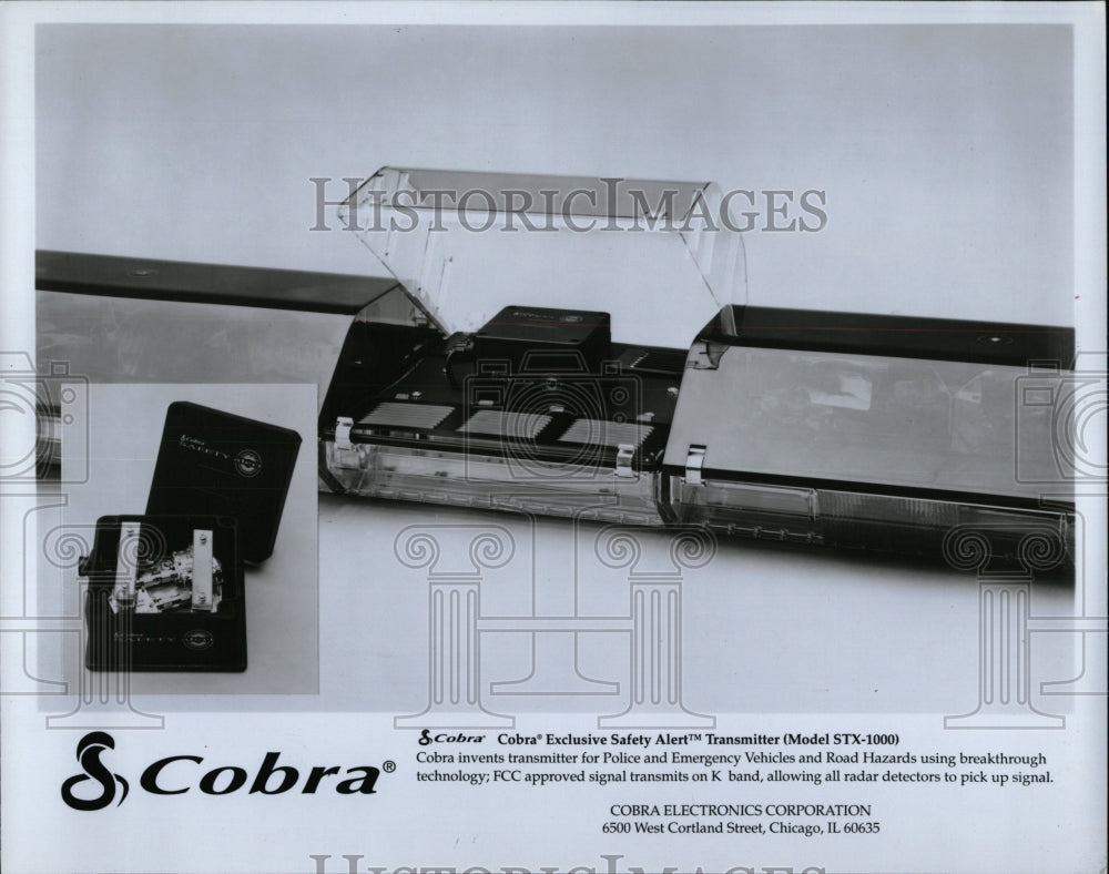 press photo Cobra exclusive safety alert transmitter - RRW90429 - Historic Images