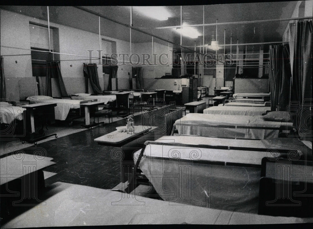 original unique and well-maintained old cook county hospital depression era  examination room reinforced clear glass