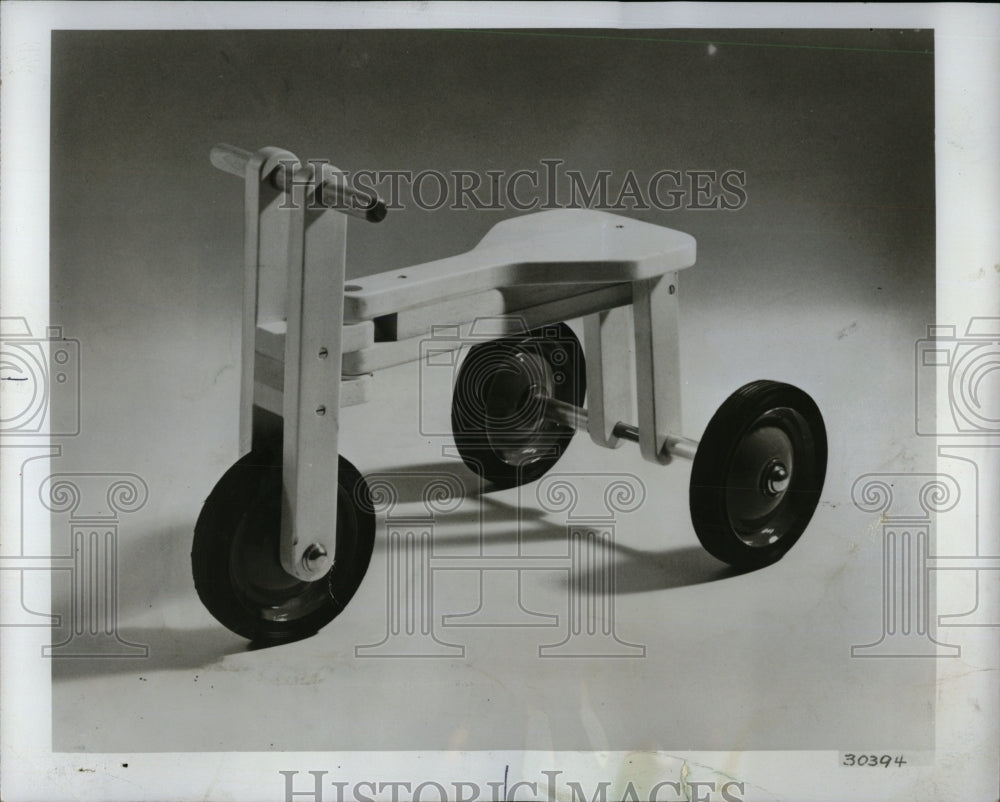 1976 Press Photo Child Wooden Tricycle Advertisement - RRW91269 - Historic Images