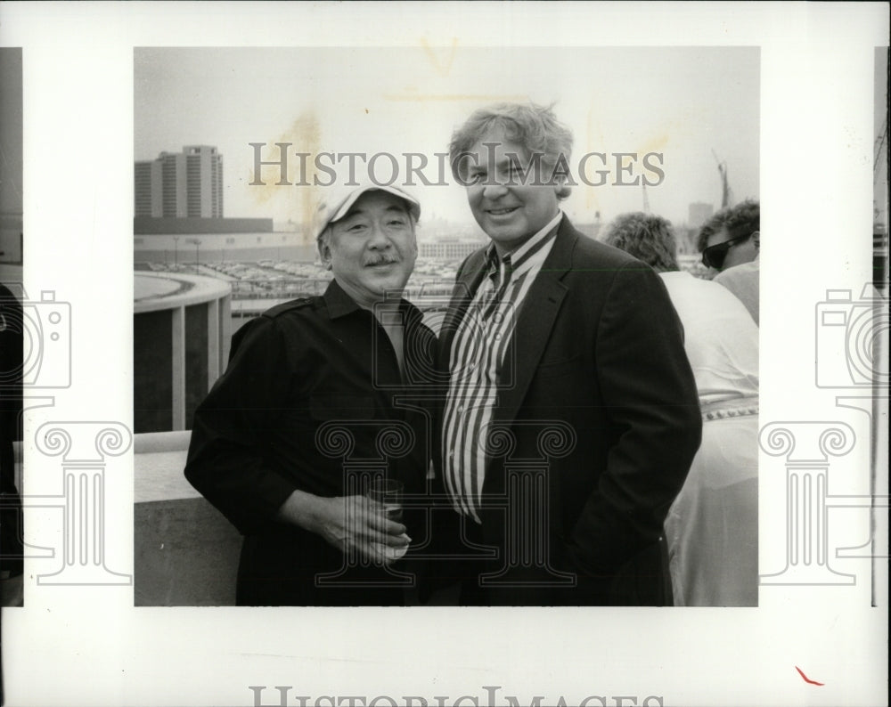 1987 Press Photo Pat Morita Rene Du Pont London England - RRW92841 - Historic Images