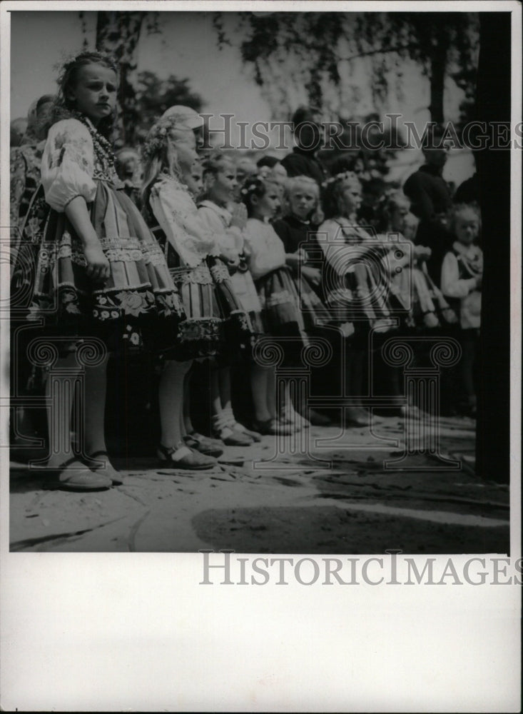 1957 Press Photo Poland people Children Row Click Snap - RRW96677 - Historic Images