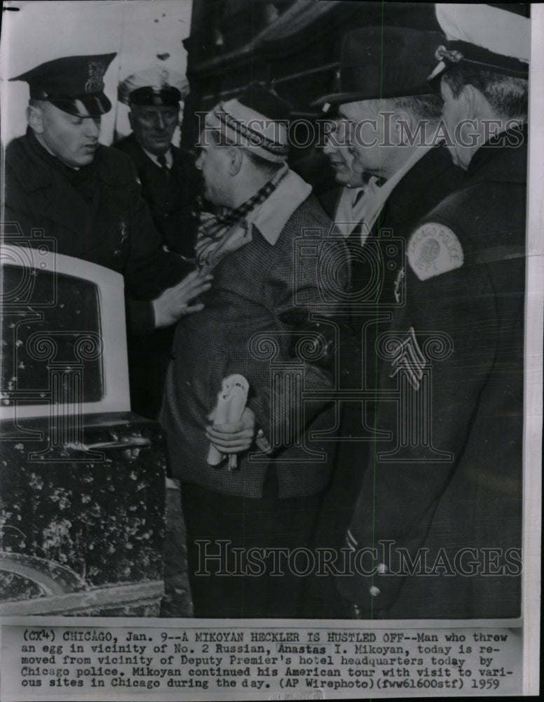 1959 Press Photo Man arrested for throwing egg at Russi - RRW99003 - Historic Images