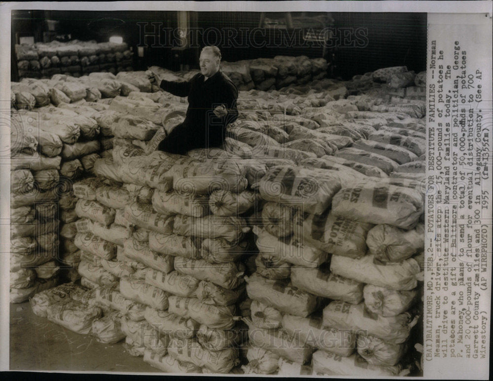 1955 Norman truck driver destitute potato - Historic Images