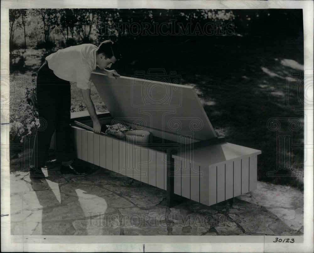 1977 Man Using Assembled Patio Bench Open - Historic Images