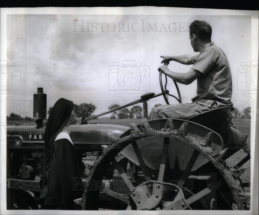 1943 Joe Kisok Cultivates his farm. - Historic Images