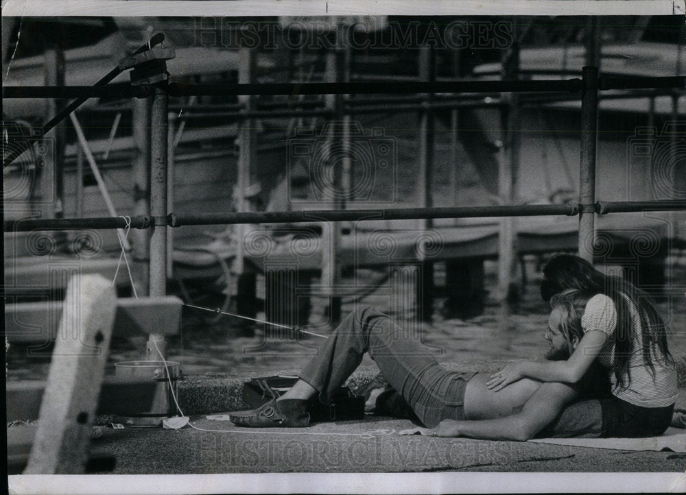 1970 Montrose Harbor seawall fishing love - Historic Images