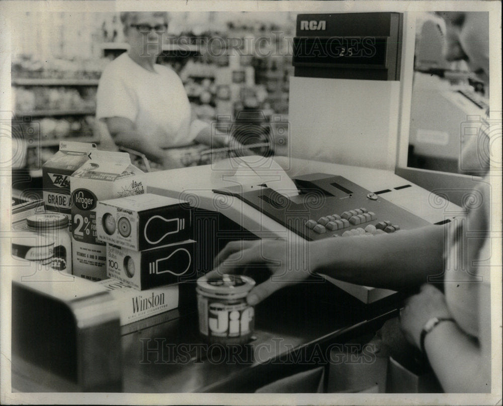 1973 Automated checkout counter. - Historic Images