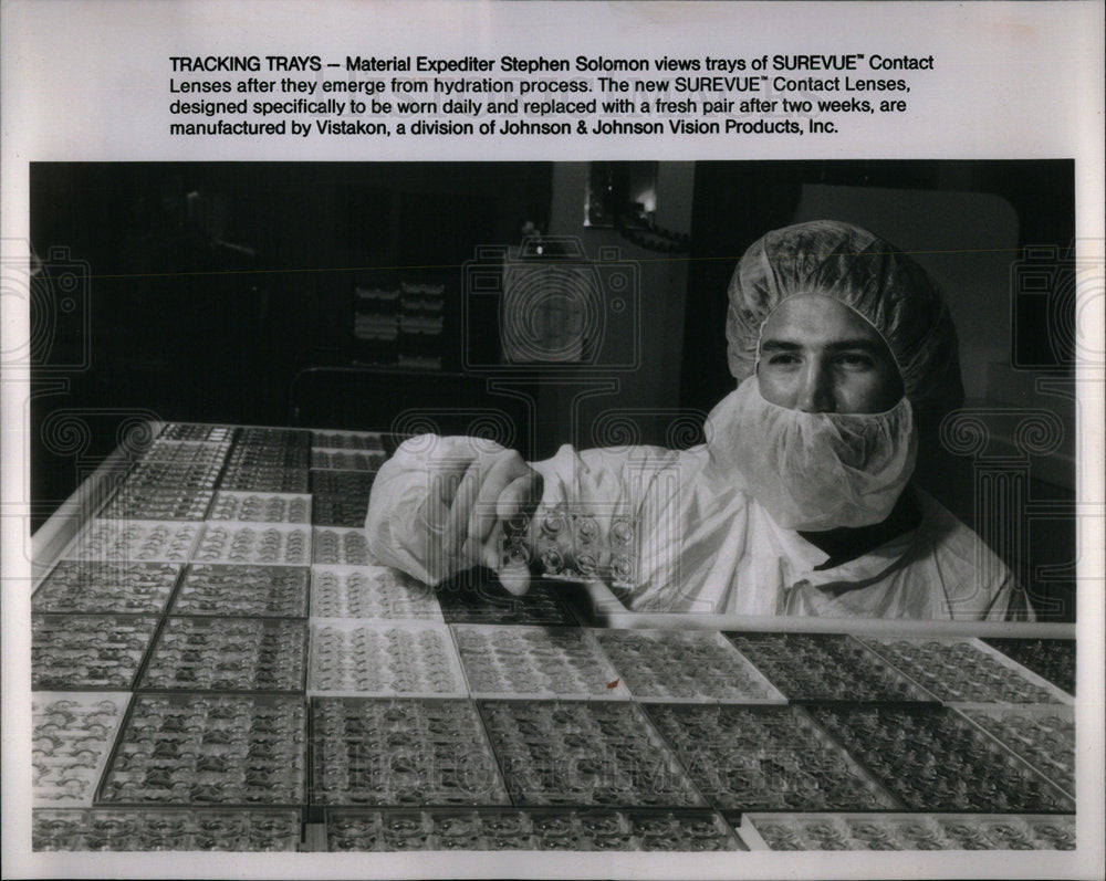 1991 Employee With Surevue Contact Lenses - Historic Images