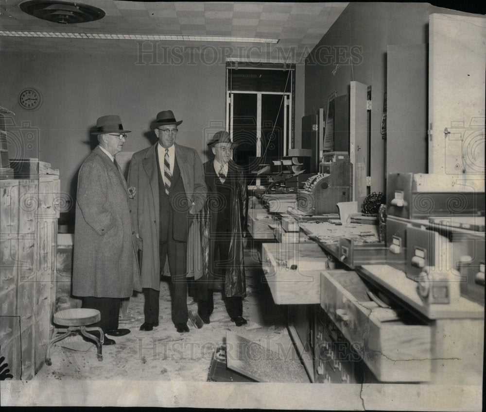 1955 Officials View Damage From Bomb - Historic Images