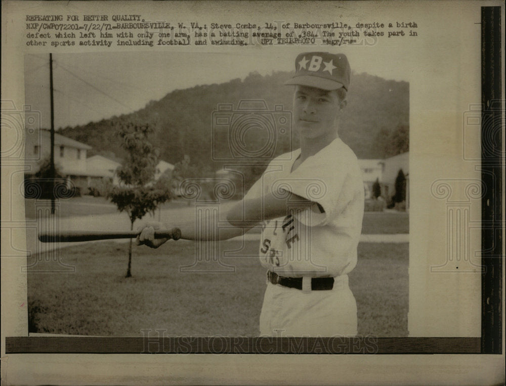 1971 Steve Combs Swings Against the Odds - Historic Images