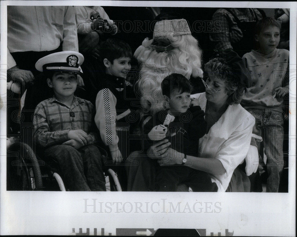 1988 Navy kids visit Santa at Glenview NAS - Historic Images