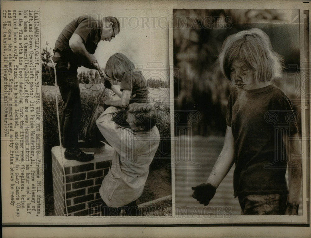 1974 Boy goes down chimney, got stuck - Historic Images