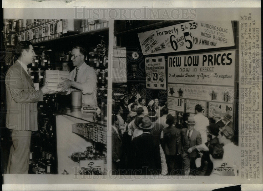 Store owners slashing prices - Historic Images