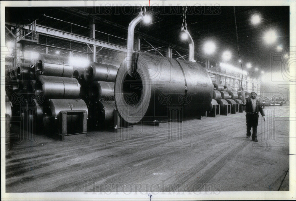 1982 Block Steel Worker Moves steel Coils-Historic Images