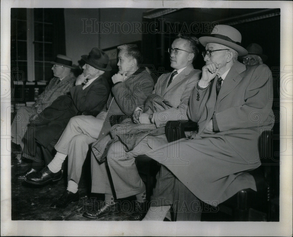 1958  5 men watching the market - Historic Images