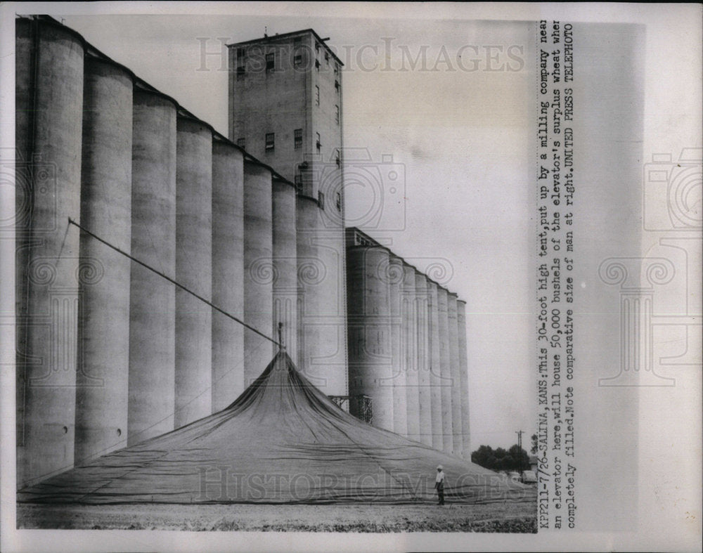 1954 39 Foot high tent near elevator - Historic Images