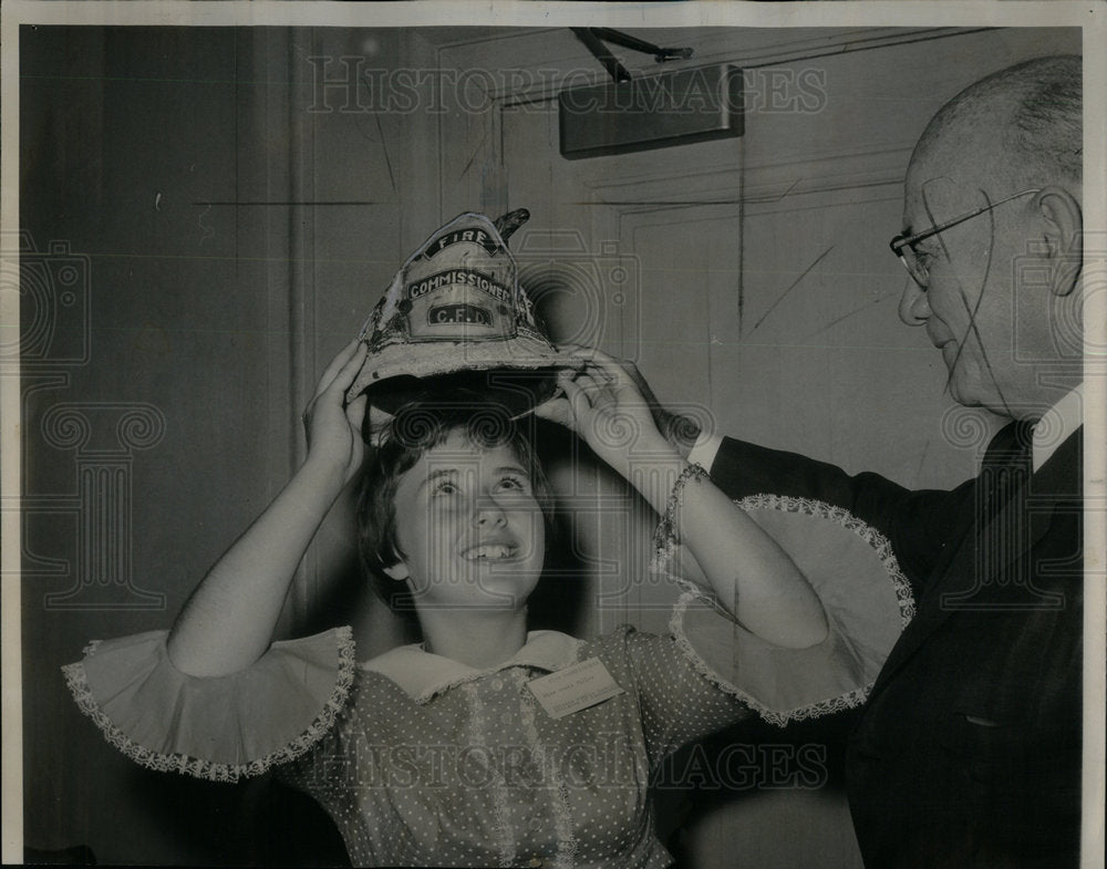 1965 Girl Fire Chief Helmet Man - Historic Images