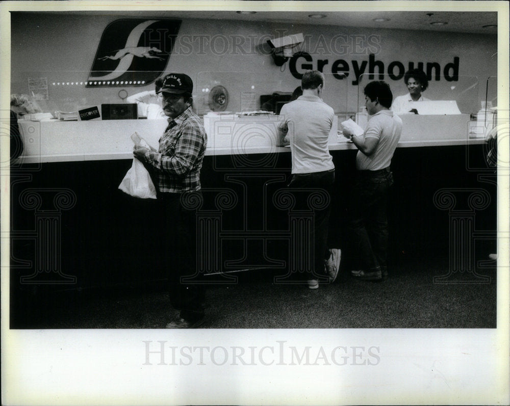 1987 People Buying ticket Bus Greyhound - Historic Images