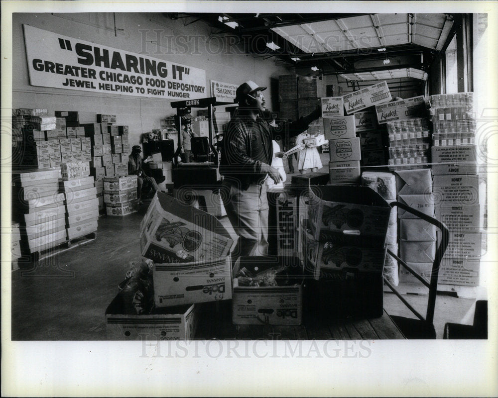 1988 Man Boxes Food Stacked Delivery - Historic Images