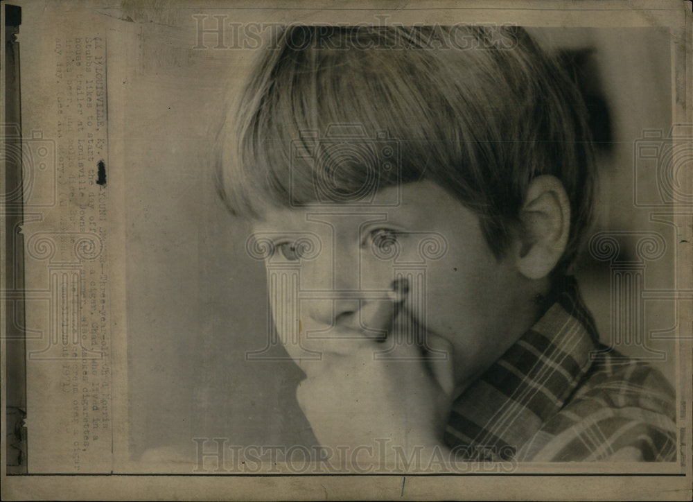 1971 Picture of a young smoker. - Historic Images