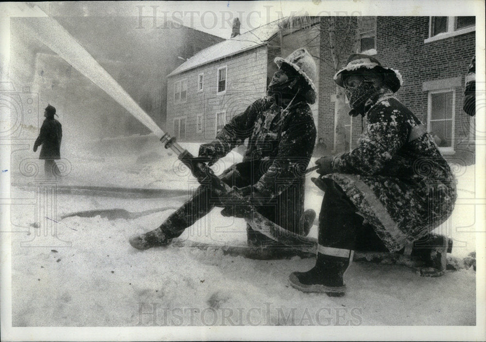 1979 Fire Fighter Ice Battle Left Families - Historic Images